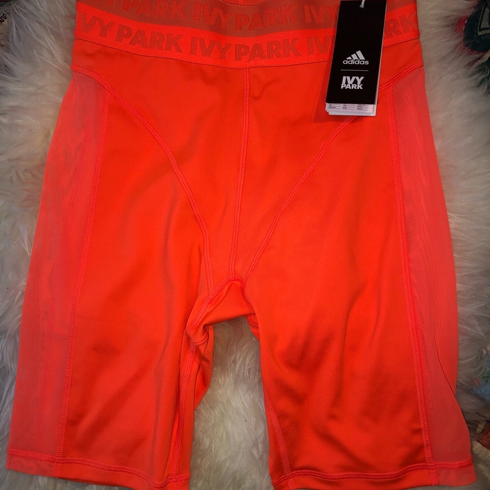 IVY PARK x ADIDAS ORANGE CYCLING SHORTS